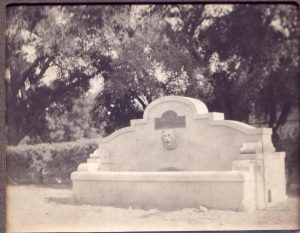 Lion head fountain on the horse trough, before the pergola was built.