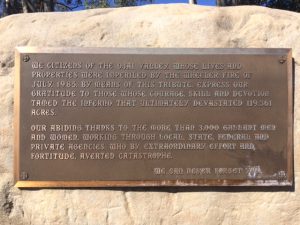 This bronze plaque is attached to a large boulder that was placed on the north side of the "Y" intersection. 